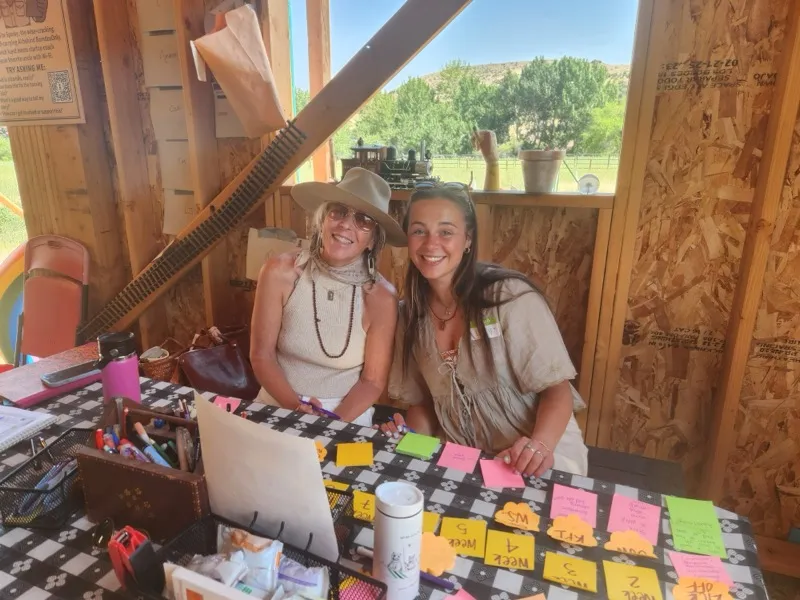 Fellows planning and organizing at workstation